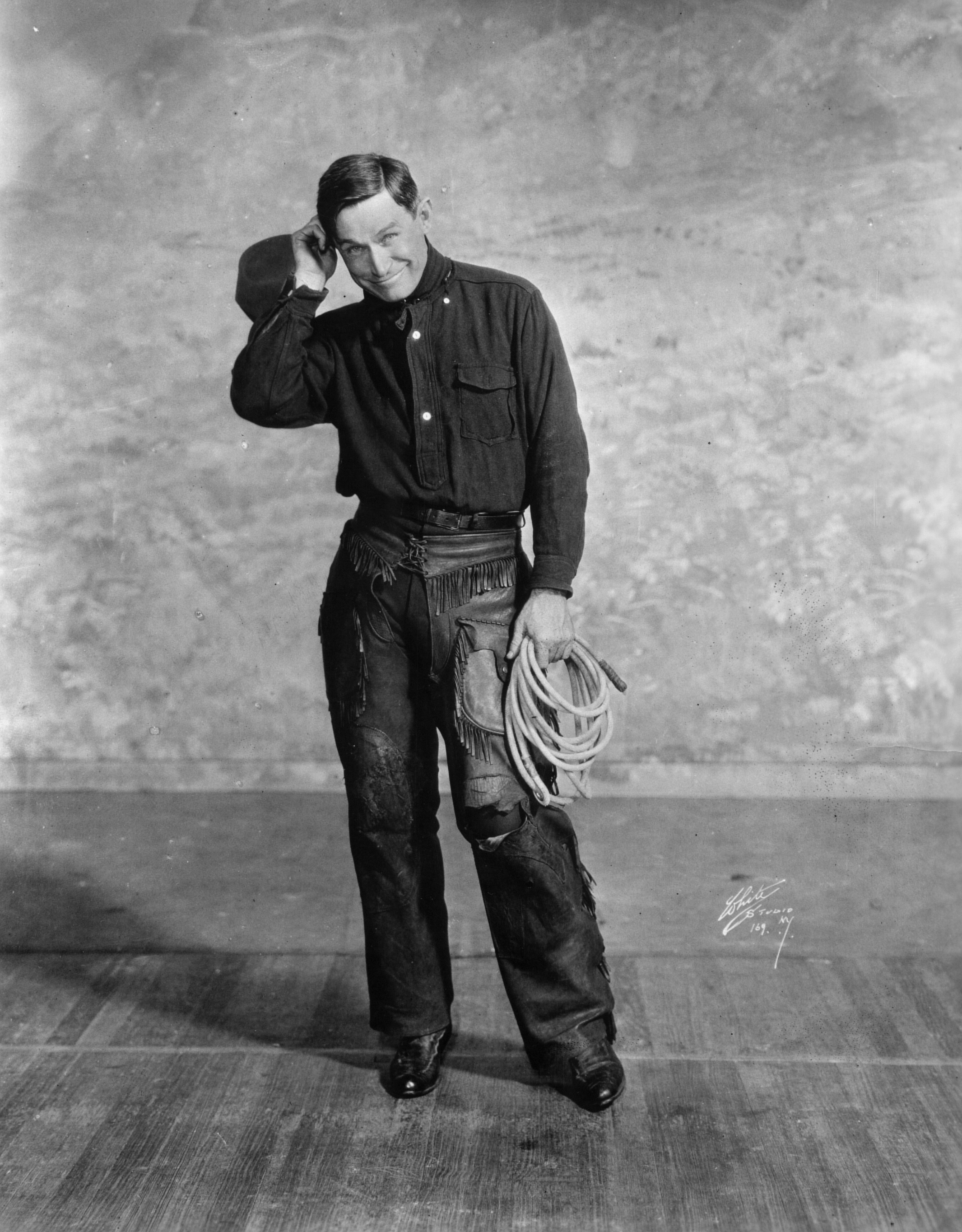 Will Rogers in famous vaudeville promotional photo.